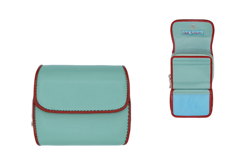 Wallet designed by Stefi Talman. Bestseller item made from european leather. Style CODES 017 in turquoise with red.